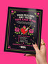 A 8.5 by 11 inch softcover coloring book titled The Feminist Rage Coloring Book For Cute Loud Unhinged Women. The black cover features vibrant pink and green typography, a fanged heart engulfed in flames, pink roses, and crescent moons. The back cover displays a heart pierced by a dagger and text reading Your feelings are valid your rage is too. Inside pages contain black and white line art with bold feminist quotes, floral borders, potions, coffins, and edgy witchy illustrations.