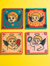Set of four square ceramic coasters featuring a vampire cupid design in a pastel goth and traditional tattoo art style. The first coaster shows a fanged cherub on a teal background with red vines. The second features a cherub crying blood tears on a red background with daggers. The third depicts a cherub holding an anatomical heart on a peach background. The fourth shows a cherub with a spiked ring. Glossy glazed finish with cork backing. Ideal for spooky home decor and anti-valentine gifts.