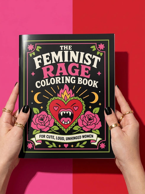 A 8.5 by 11 inch softcover coloring book titled The Feminist Rage Coloring Book For Cute Loud Unhinged Women. The black cover features vibrant pink and green typography, a fanged heart engulfed in flames, pink roses, and crescent moons. The back cover displays a heart pierced by a dagger and text reading Your feelings are valid your rage is too. Inside pages contain black and white line art with bold feminist quotes, floral borders, potions, coffins, and edgy witchy illustrations.