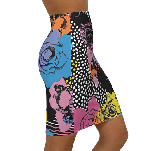 High-waisted mini skirt with a multicolor floral collage print featuring graphic roses, polka dots, and stripes. Bodycon fit in a bright palette including pink, yellow, blue, and orange. Made of stretchy poly-spandex blend and styled in colorful festival outfits. Sizes XS to XL available.