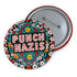 Round pinback metal button with an embroidered-style design on a black background. The center displays the phrase "PUNCH NAZIS" in bold, white stitched-textured lettering with red accents. Surrounding the text is an elaborate folk-inspired floral pattern, densely packed with embroidered-style flowers in shades of red, yellow, blue, pink, and white. The intricate design includes symmetrical lace-like stitching and decorative motifs, creating a rich, tapestry-like effect. The button has a silver metal back wi