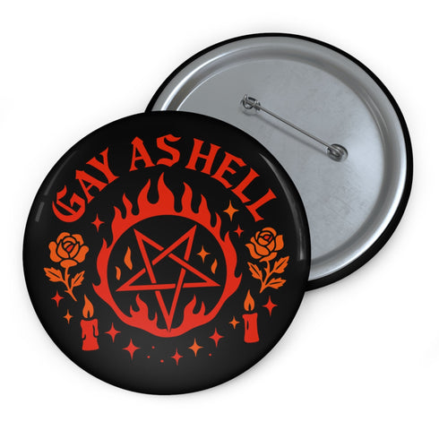 Round glossy pinback button measuring 2.25 inches with bold red graphic design on a black background. Text reads “Gay As Hell” above a red pentagram surrounded by flames, stars, roses, and candles. Made of tinplate with a safety pin back and a scratch-resistant mylar finish. The button features a high-gloss surface and is lightweight and durable, perfect for jackets, bags, or accessories.