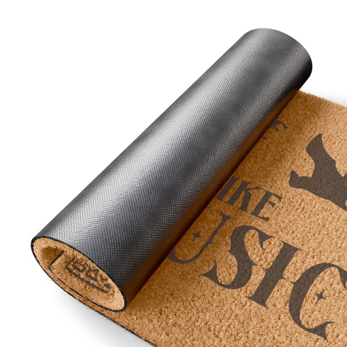 Tan coir doormat featuring "Welcome, Hope You Like Goth Music" in black text, with bat and skull imagery and gothic-style corner decorations.