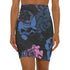 High-waisted black mini skirt with a bodycon fit, featuring a bold allover floral graphic print in pink and blue. Made of stretchy polyester-spandex blend with a smooth finish. Styled in various festival and streetwear looks. Available in sizes XS to XL.