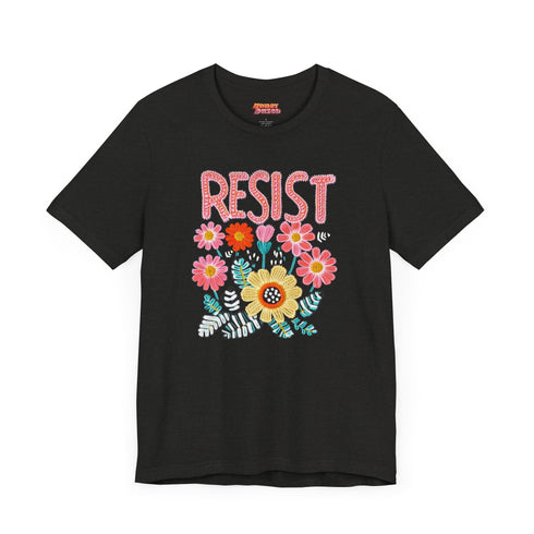 Black unisex t-shirt with "Resist" in bold, embroidered-style floral print. Political activism shirt with a vintage, handcrafted feel.