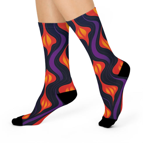 Black crew socks featuring a fiery red, orange, and purple lava-lamp-inspired wave pattern.