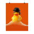 A fine art print of a rubber duck dressed like Alex from A Clockwork Orange, featuring a black bowler hat, blunt bob, and white suspenders. The duck floats in orange-tinged bubbles and is framed in white on a glossy pink tile bathroom shelf.