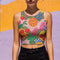 Vibrant Y2K maximalist crop top featuring bold tropical pineapples, leopard print, sweet cherries, and geometric patterns in bright yellow, pink, green, and blue colors. Perfect festival rave wear, alternative fashion, and retro summer styling for women who love aesthetic streetwear and unique party outfits