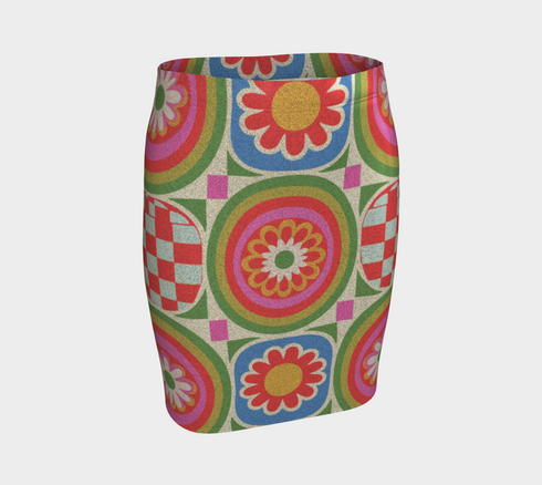 A vibrant bodycon mini skirt featuring a structured grid of retro geometric medallions. The pattern includes concentric circles in red, yellow, and blue, stylized daisy flower motifs, and red and white checkered squares. The skirt has a high-waist elastic band and a smooth, matte performance knit texture. The background is a neutral off-white. This maximalist design utilizes saturated primary colors to create a 70s-inspired psychedelic aesthetic. No purple or navy is present in the print.