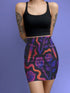High-waisted mini skirt with dark botanical print featuring violet roses, fiery orange daggers, and swirling ribbon-like accents on a black background. Form-fitting silhouette with stretch eco-poly fabric and elastic waistband. Available in metallic glitter or smooth finish. A bold look for gothic, witchy, or alternative festival fashion.