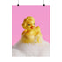 A fine art print of a glamorous rubber duck styled like Marilyn Monroe, with short curled blonde hair and soap bubbles. Displayed in a gold ornate frame against a pink wall with orange bead curtains.