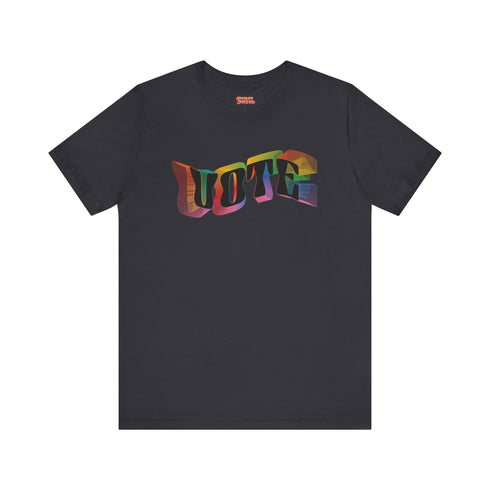 Election 2024 t-shirt with "VOTE" printed in large, colorful letters. Each letter features a different color from the rainbow spectrum, styled in a groovy 70s-inspired font.