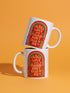 A glossy white porcelain ceramic mug featuring a vibrant maximalist design centered on the exterior. The artwork displays a retro 1970s-inspired rainbow arch composed of concentric bands in burnt orange, mustard yellow, and teal green. Inside the arch, stylized vintage bubble-serif typography in reddish-orange reads PEACE LOVE AND PLEASE DON'T TALK TO ME. The design evokes a groovy, hippie aesthetic mixed with sassy introvert humor.