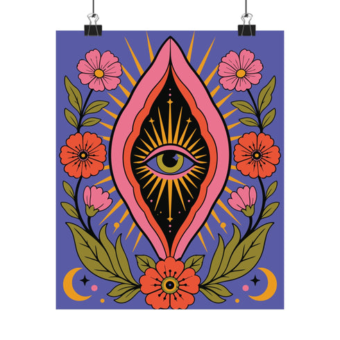 A vertical art print featuring a central pink yoni shape with a black interior containing a single eye. Golden yellow sun rays radiate from the center against a solid periwinkle blue purple background. The central motif is surrounded by a symmetrical botanical border of pink and red daisy flowers and green leaves, with two yellow crescent moons in the bottom corners. Printed on flat museum grade matte paper. This is the printed artwork only; a frame is not included. Ready to frame.