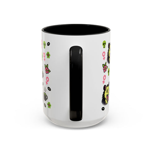 Possum Feminist Feral Before Coffee Mug (11, 15oz) features a pop-art design with hedgehog heads, skulls, female symbols, flowers, coffee beans, and cups. Ideal for chaotic mornings, perfect goth or neurodivergent gift. Dishwasher safe.
