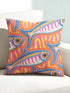 Flat printed square throw pillow cover featuring a faux embroidery texture. The vibrant maximalist design showcases stylized blue, pink, yellow, and white fish swimming in a dynamic, swirling pattern across a bright orange background. The artwork mimics heavy crewelwork yarn and stitching, but the material is a smooth 2D flat print. The pillow is shown as a finished square cover, designed to add bright, colorful eclectic fisherman aesthetic decor to any sofa or seating area.