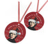 "Round red metal Christmas ornament featuring Nick Cave in black and white with Santa hat, Nordic patterns, and 'Where The Wild Mistletoes Grow' text, suspended by red ribbon