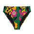 High-waisted bikini bottom with a bold retro floral print in green, yellow, pink, and black. Features cheeky fit and double-layered construction, floating on a turquoise pool background. The maximalist flower pattern and pop-art color palette give strong Y2K and festival vibes. Perfect for summer beach days, pool parties, and dopamine dressing.