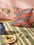 Flat printed square throw pillow cover featuring a faux embroidery texture. The vibrant maximalist design showcases stylized blue, pink, yellow, and white fish swimming in a dynamic, swirling pattern across a bright orange background. The artwork mimics heavy crewelwork yarn and stitching, but the material is a smooth 2D flat print. The pillow is shown as a finished square cover, designed to add bright, colorful eclectic fisherman aesthetic decor to any sofa or seating area.