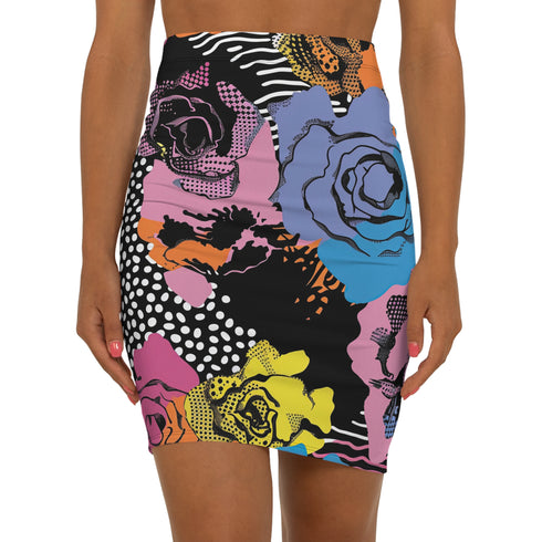 High-waisted mini skirt with a multicolor floral collage print featuring graphic roses, polka dots, and stripes. Bodycon fit in a bright palette including pink, yellow, blue, and orange. Made of stretchy poly-spandex blend and styled in colorful festival outfits. Sizes XS to XL available.