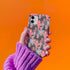 Stylish phone case with a colorful collage of iconic artists including Frida Kahlo, Warhol, Dali, and Keith Haring. Vibrant pop art design features stylized portraits on a dark background, perfect for art lovers.