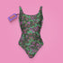 a bathing suit on a pink background