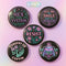 Set of five 2.25-inch round button pins featuring feminist and witchy designs with pastel artwork on a black background. Includes slogans like “Hex the System,” “Tell Me to Smile and I’ll Scream,” “Romanticize Your Rage,” “Consent or Coffin,” and “Resist.” Each button has a safety pin backing, a durable tinplate body, and a glossy, scratch and UV-resistant finish with purple, pink, teal, and mint accents.