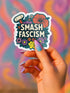 Matte vinyl political sticker sheet measuring 9.8 x 14 inches with 6 unique kiss-cut designs including “Fight for Your Rights,” “Eat the Rich,” “Smash Fascism,” “Disobey,” “Resist,” and “Tax the Rich.” Stickers range from 2 to 3.5 inches in size, printed in full color with floral accents and bold lettering. Weather-resistant and semi-permanent for use on laptops, water bottles, journals, or cars.