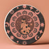 Round ceramic coaster featuring a stylized black cat with polka dots surrounded by pink flowers, moons, and stars on a black background with pink accents