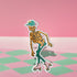 A sticker featuring a whimsical skeleton dressed in a green cowboy hat, casually posed with one leg propped up. The skeleton sports a full grin and is adorned with vibrant teal and orange roller skates, adding a playful and surreal touch to the design.