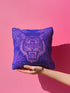 Square woven pillow featuring fierce magenta tiger with bared fangs against electric purple background surrounded by neon jungle leaves. Textured tapestry creates vibrant maximalist tiger decor perfect for gothic, y2k or eclectic room styling.