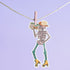 Sticker featuring a skeleton wearing a cowboy hat and holding a boombox on its shoulder, clad in roller skates. Perfect for adding a playful touch to any surface.