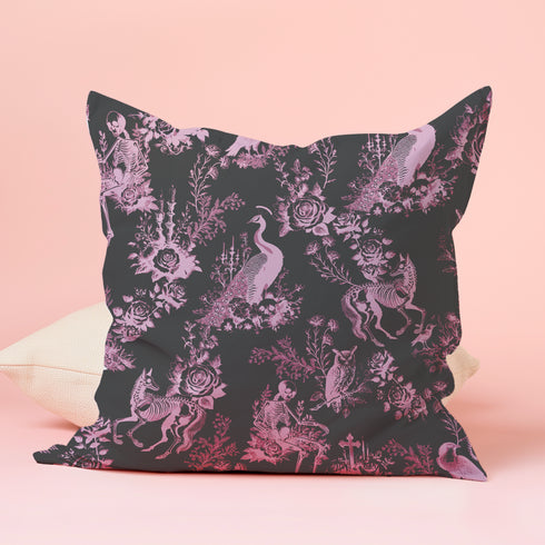 Luxury throw pillow cover featuring a gothic toile pattern in lavender on a black background, with skeletal figures, peacocks, and floral motifs.