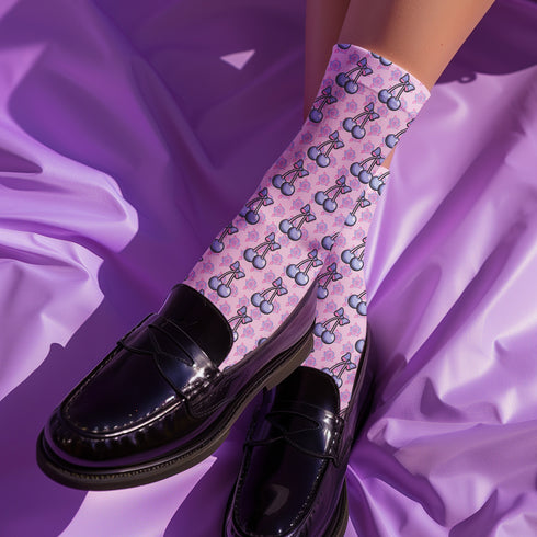 Fun and playful cherry bow-patterned pink socks with black heels and toes,  ideal for those who love quirky and cute designs