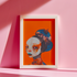 Avant-garde digital portrait of an African woman with striking features against a vivid orange background. An elaborate headdress of dark, floral elements creates a stunning contrast, embodying surrealist themes and African cultural motifs.
