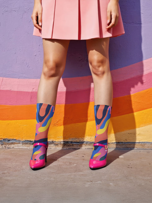 Glossy black pinback button with floral art and bold white text that reads “Hands Off My Body.” Feminist political button featuring bright pastel flowers in pink, red, orange, and yellow. Metal pin with durable safety pin back, shown in various settings: held by hand, displayed on pedestal, and against colorful street art. Available in 2" and 3" sizes, perfect for backpacks, jackets, tote bags, or as a gift for feminist allies and book lovers.