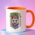 White ceramic coffee mug with pink or orange interior and handle, featuring a double-sided colorful design of a screaming possum wearing a flower crown with the phrase “The Future is Femme & Feral.” The design includes skulls and feminist symbols with a neon, pastel, and spooky aesthetic. Available in 11oz and 15oz.
