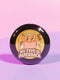 A glossy black round pin-back button with a retro 1970s-style design. The center shows a smiling cartoon paperback book holding a red rose, colored light brown with white gloves and feet. Below, “MY TYPE IS PAPERBACK” appears in chunky brown-and-tan 70s lettering. This bookish flair piece has a high-gloss, scratch-resistant mylar finish, secure safety pin backing, and comes in two- or three-inch sizes.