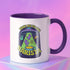 White ceramic coffee mug with a bright yellow handle and interior, featuring a printed alien abduction design with two purple cats, peace signs, and the phrase “Take Me to Your Barista” in green and purple text.
