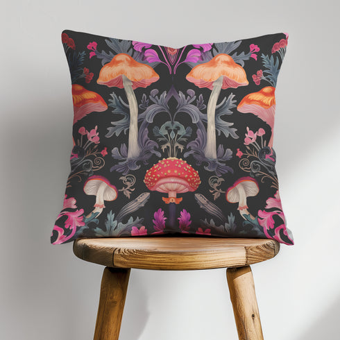 Designer throw pillow cover featuring an intricate mushroom and foliage pattern in warm oranges, soft pinks, and regal purples against a dark background.
