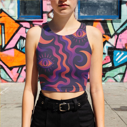 Cropped tank top with psychedelic purple and coral swirling waves pattern featuring mystical third eye designs, racerback style sleeveless womens festival top with body-hugging fit for rave outfits, alternative clothing, y2k aesthetic streetwear, trippy spiritual print crop top for concerts and music festivals, black owned shops bohemian mystical shirt