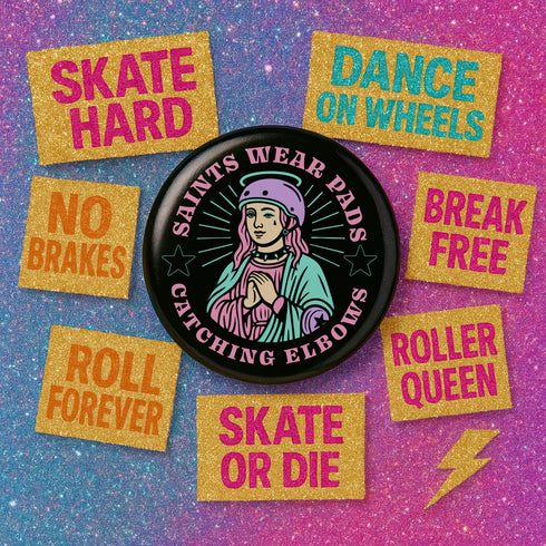 Pinback button badge featuring a saint-inspired roller skater wearing pads and a helmet, with pink hair and teal robes. Surrounded by retro starbursts, the black button reads “Saints Wear Pads Catching Elbows” in pastel pink and teal lettering. Design is bold, colorful, and printed on a glossy metal surface with a classic safety pin back. Available in 2.25" or 3" sizes.