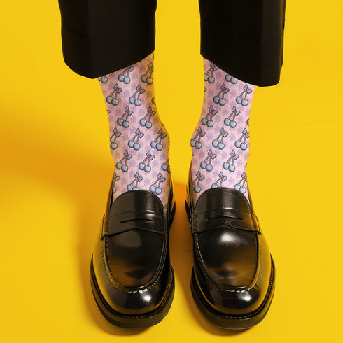 Fun and playful cherry bow-patterned pink socks with black heels and toes,  ideal for those who love quirky and cute designs