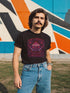 Unisex black t-shirt featuring a faux-embroidered design of a flaming open book with roses and dual daggers, surrounded by gothic flourishes and text that reads “Soft Spines, Sharp Minds.” Printed in vivid pink and red tones with ornate detailing. Available in 100% cotton or vintage-feel cotton/poly blend, sizes S–3XL. Perfect for goth book lovers, alt fashion fans, and anyone who blends brains with rebellion.