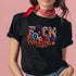 Black unisex T-shirt with bold floral embroidery-style text reading "F*ck Tyrants" in vibrant colors.