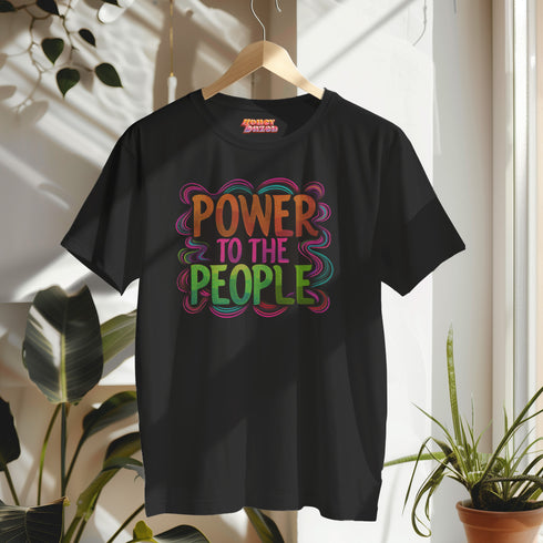 Black unisex t-shirt with colorful "POWER TO THE PEOPLE" text design in orange, pink, and green lettering surrounded by swirling psychedelic rainbow border.