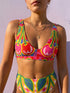 Vibrant two piece maximalist bikini with a v neck bralette top and high waisted bottom. The fabric mixes a bright yellow and hot pink gingham checkerboard with oversized neon pink and red cherries, green leaves, and semicircle watermelon shapes with white dots along the lower edge. Smooth, stretchy recycled polyester with UPF 50 sun protection and removable padding. Bold retro pop art swimwear in saturated dopamine colors, built for pool parties, vacation outfits, and fun beach days.