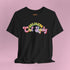 An election 2024 t-shirt with a colorful retro-style graphic that reads "Childless Cat Lady" across the chest. The text is in a playful, curvy font with each word in a different color - "Childless" in yellow-green, "Cat" in pink, and "Lady" in purple. Small cat face icons are incorporated into the letters 'a' in "Cat" and "Lady".
