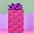 Vibrant pink wrapping paper featuring Occult symbol Baphomet Santas throwing horns, surrounded by flaming pentagrams and "All Hail Santa" text. A punk rock twist on Christmas gift wrap.