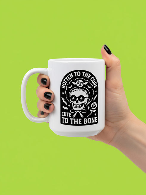 Gothic Rotten to the Core Skull Mug, 15oz Ceramic Pastel Goth Skeleton Coffee Cup, perfect for goth enthusiasts and quirky gift seekers. Ideal for unique morning rituals.